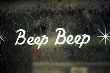 Beep beep text on a window