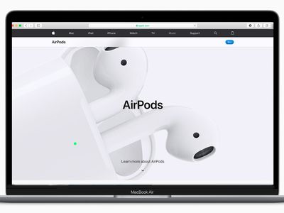 A MacBook Air with the AirPods webpage displayed on it