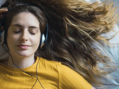 Woman listening to her headphones